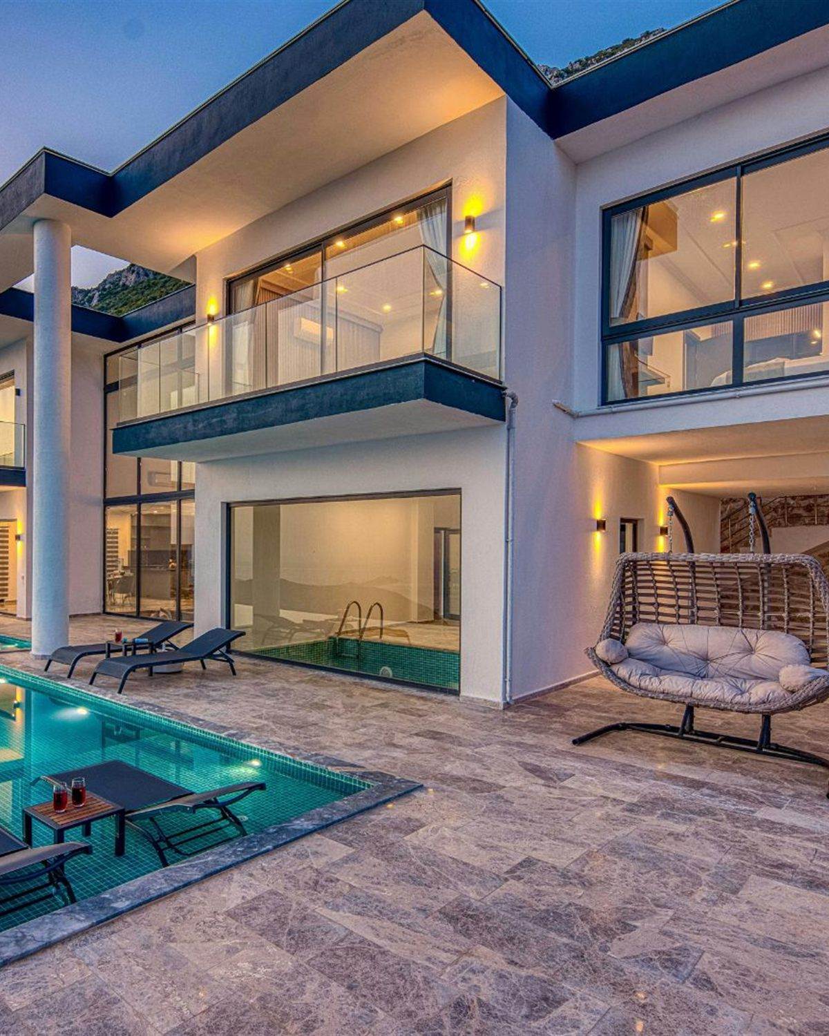 Glendale, AZ hillside home at sunset with an infinity-edge pool